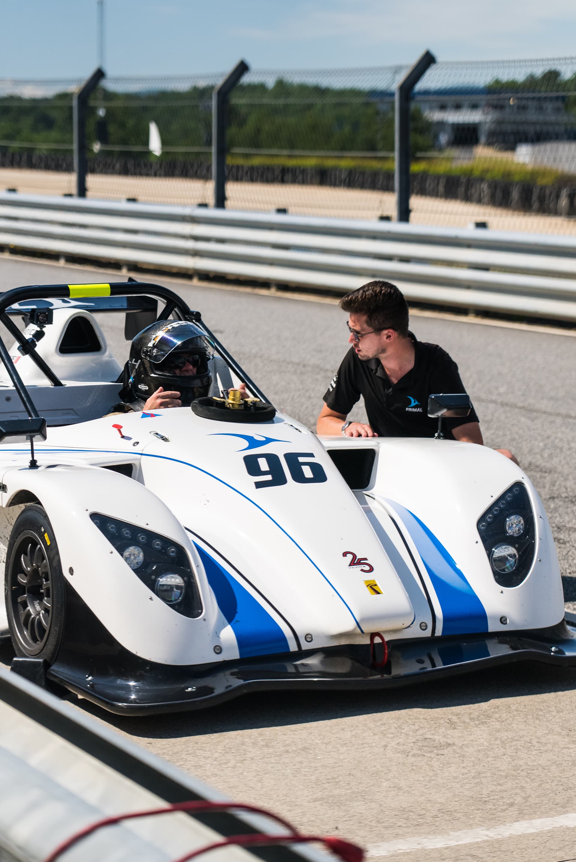 Racing school instruction — classroom and on-track coaching